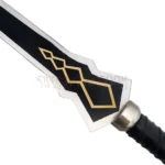Close-up of the Yuuki Konno Sword guard featuring black and gold decorative accents with polished silver fittings.