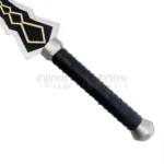 Close-up of the Yuuki Konno Sword guard featuring black and gold decorative accents with polished silver fittings.