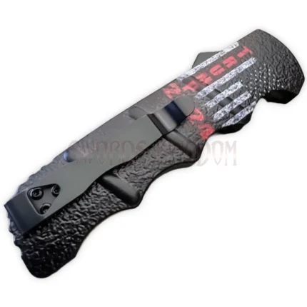 Close-up of the black textured handle with Trump 2024 and American flag design.